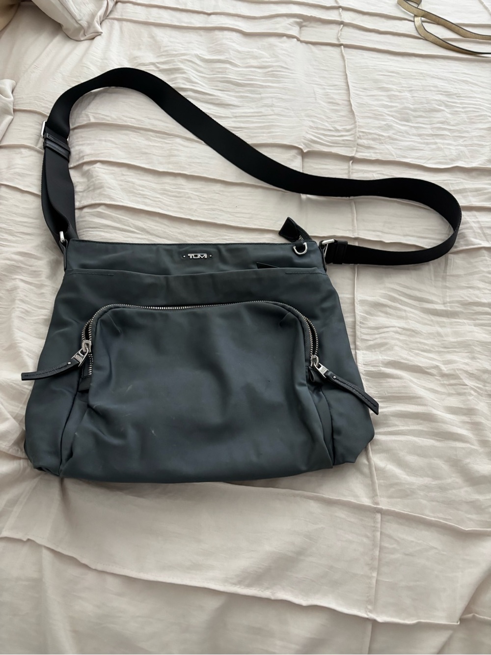 Tumi Grey Nylon Crossbody with Front and back Pocket and Adjustable Strap